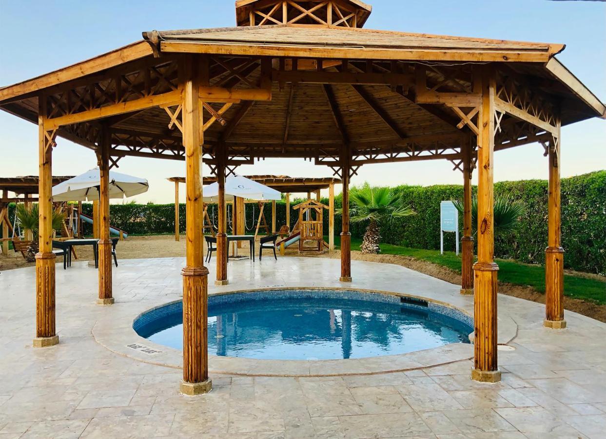 The Cascades Golf Resort, Spa & Thalasso Soma Bay Exterior photo Swimming pool at the school