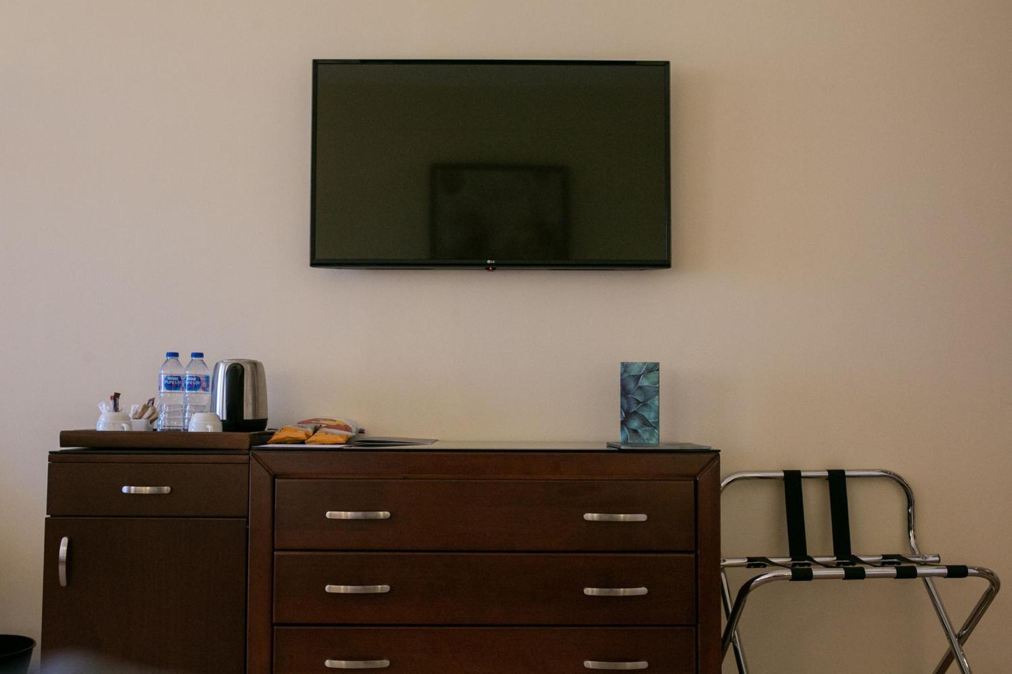 The Cascades Golf Resort, Spa & Thalasso Soma Bay Exterior photo A wall-mounted television